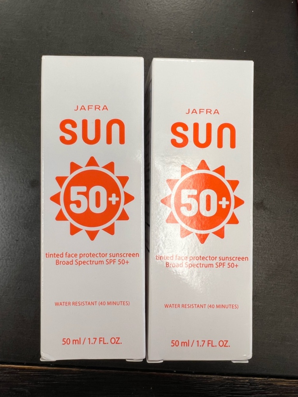 JAFRA SUN Tinted Face Protector SPF 50+ - White and Orange